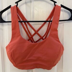 Lululemon Athletica orange free to be sports bra